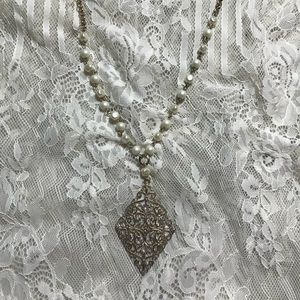 Pearl and gold necklace